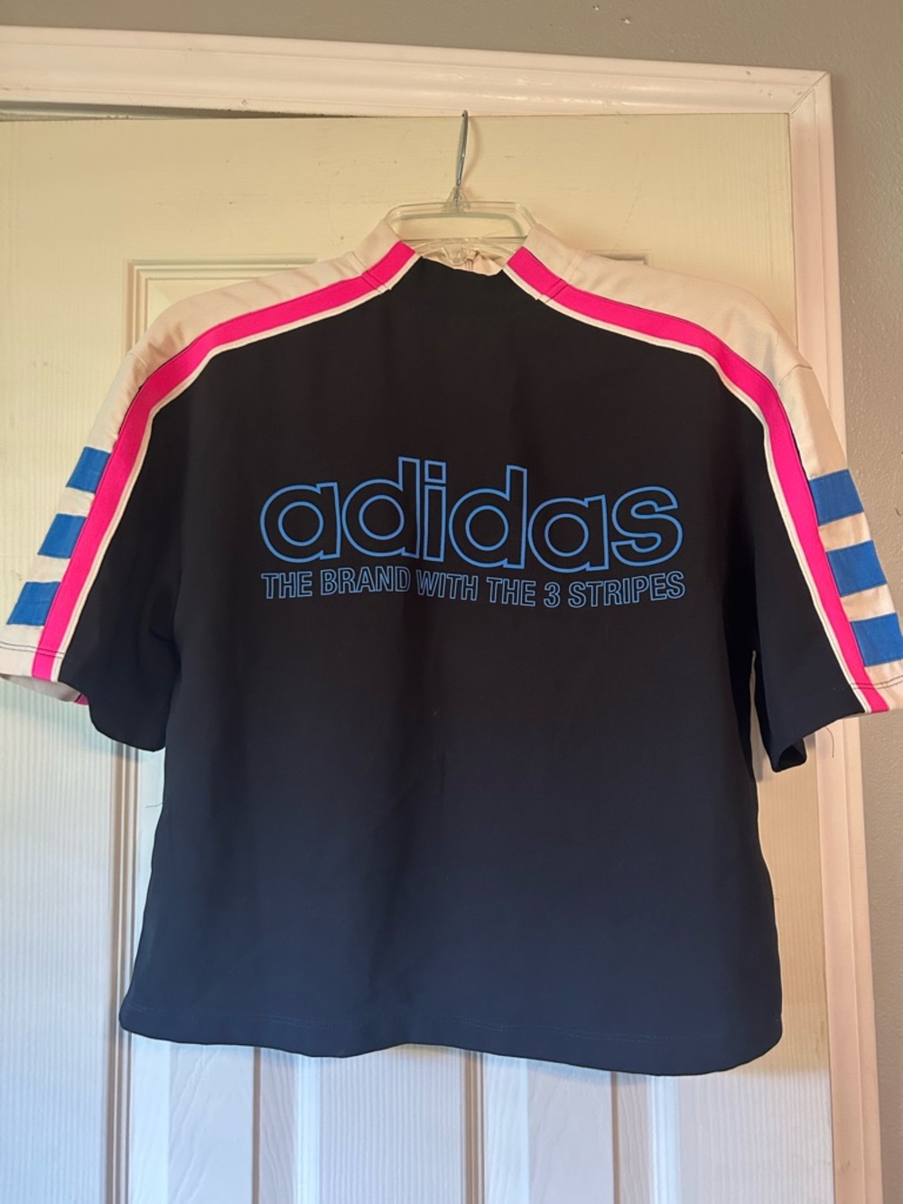 Adidas blue crop top brand with blue stripes